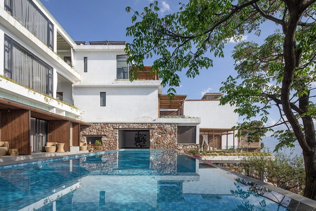 Dali Munwood Panorama Resort Hotel / IDO + Chongqing Hexin Architectural Design Institute - Hotels