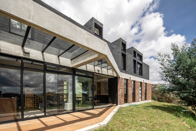 Casa en La Esperanza  / Plan:b arquitectos - Casas, Fachada