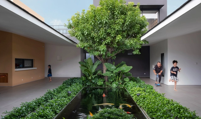 Casa Hoc Mon / TAA DESIGN - Fotografía exterior, Casas, Patio interior