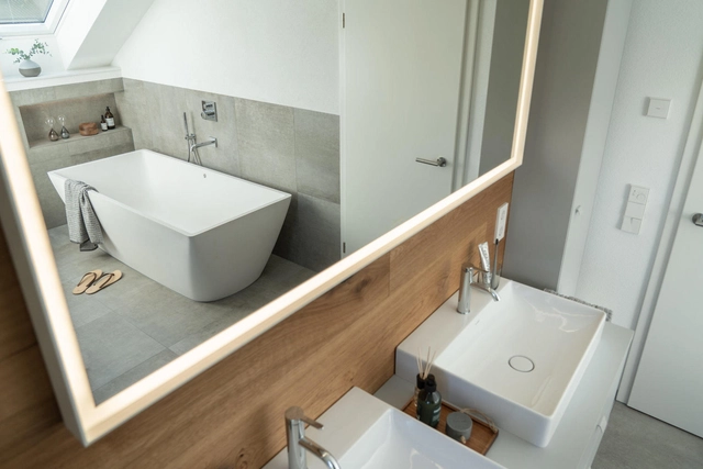 Natural Wood, Gray and White: How to Update a 90's Bathroom - Featured Image