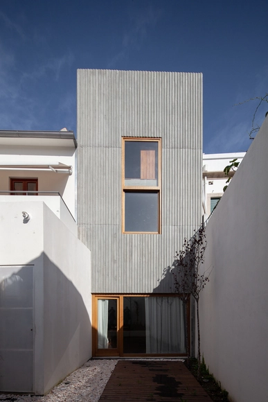Casa para uma Pianista / Pedra Líquida - Fotografia de Exterior, Casas