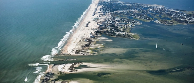 We Must Begin Planning Now for an Inevitable Sea Level Rise - Featured Image