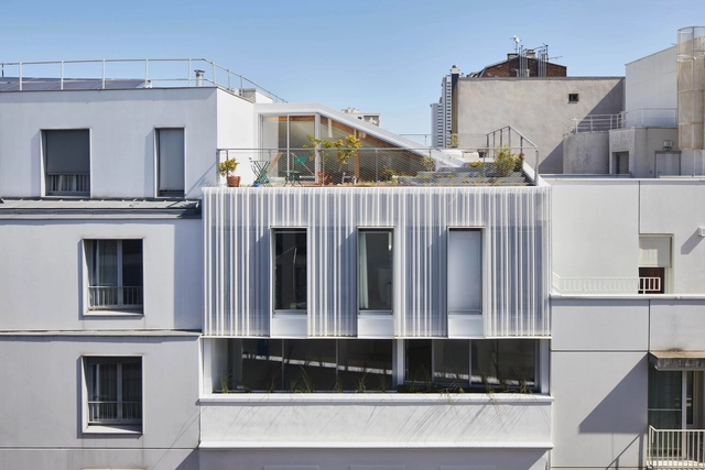 Vivir en el tejado / rotunnojustman - Fotografía exterior, Renovación