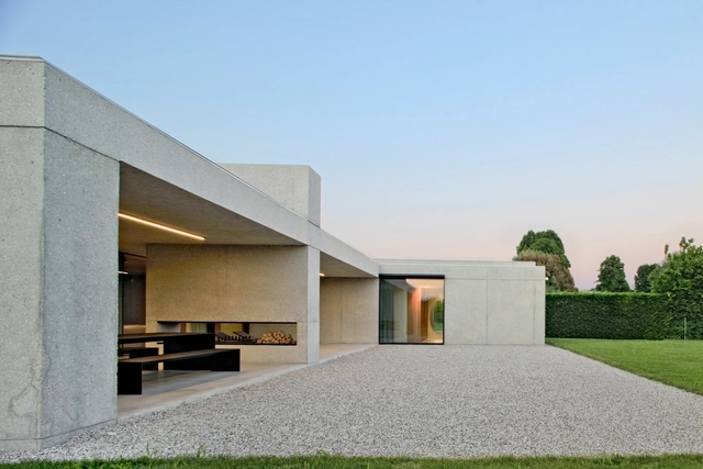 Casa rodeada de vegetación / MIDE architetti  - Fotografía exterior, Casas, Fachada