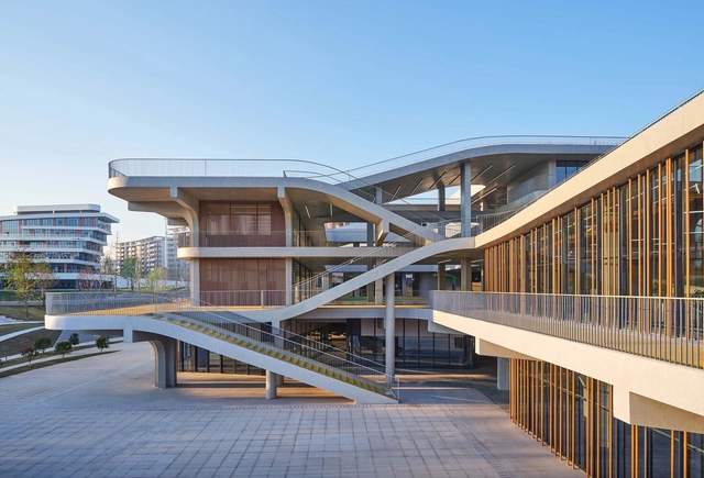 Student Community Center at Yangtze Delta Region Institute / TJAD Time & Space Architecture Studio - Exterior Photography, Office Buildings, Facade, Handrail, Stairs, Beam