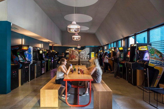 Playful Hospitality Spaces Designed for Gamers of All Ages and Eras - Featured Image