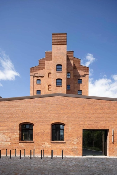 A Refurbished Industrial Landmark in Berlin Converted Into a Multi-Use Building - Featured Image