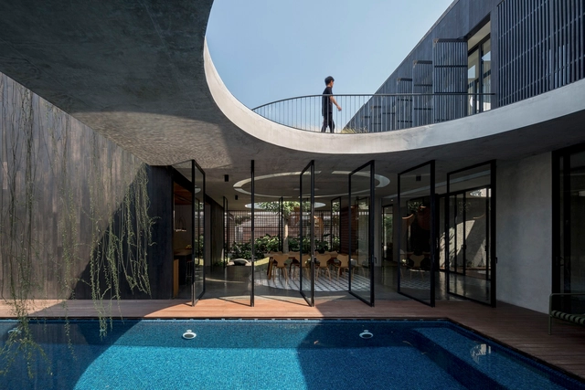 Casa Halo / Tamara Wibowo Architects - Fotografia de Exterior, Casas, Fachada, Iluminação, Cadeira