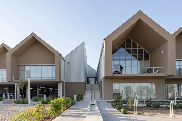 JAX-MOC Offices / BRICKLAB + studiolibani - Adaptive Reuse