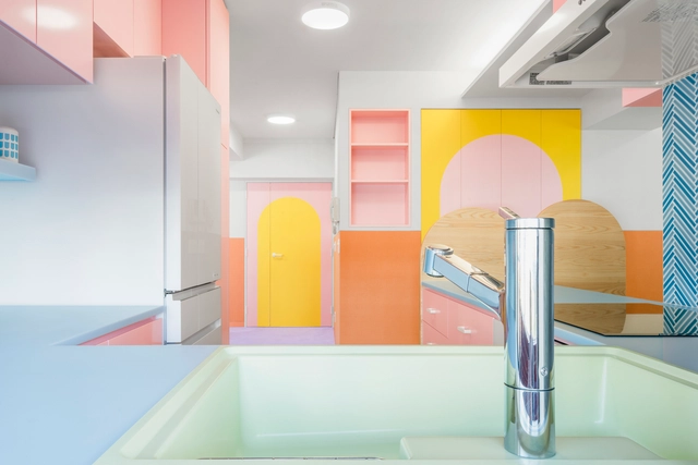 Vibrancy and Utility: Embracing Color in Urban Apartment Kitchens - Featured Image